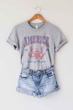 Load image into Gallery viewer, AMERICA LAND OF THE FREE GRAPHIC PLUS SIZE TEE
